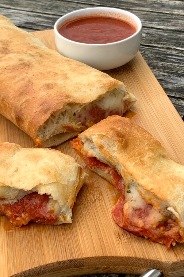 Slices of stromboli from frozen bread dough on cutting board